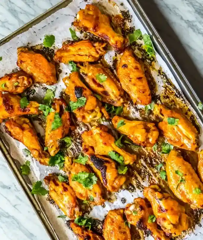 cuisson ailes de poulet au four sur papier cuisson